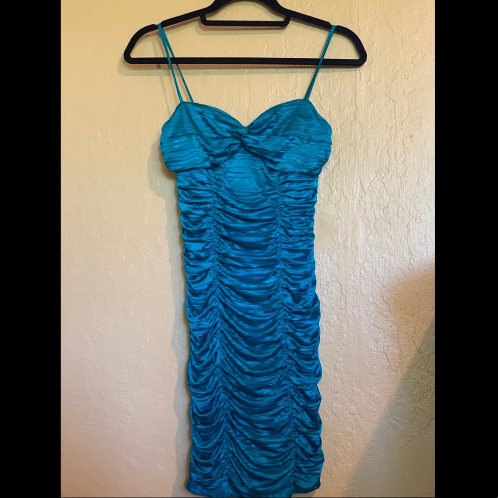 Body shaping turquoise dress